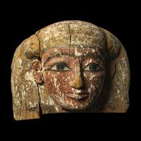 An Egyptian Painted Wood Sarcophagus Head