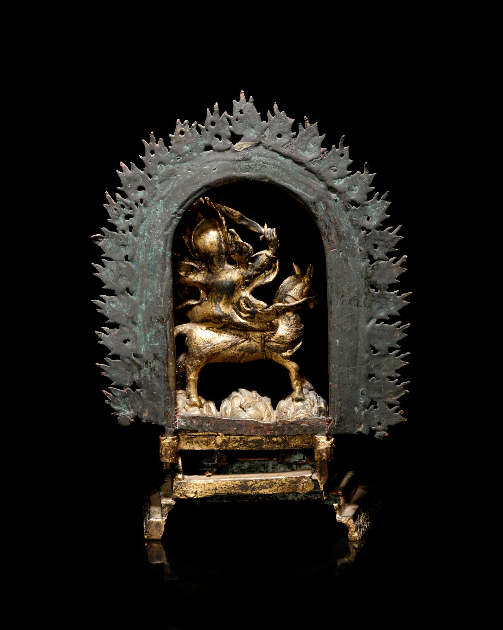A Tibetan Gilt Bronze Figure of Palden Lhamo