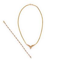 Ruby, Diamond, and Yellow Gold Necklace and Bracelet
