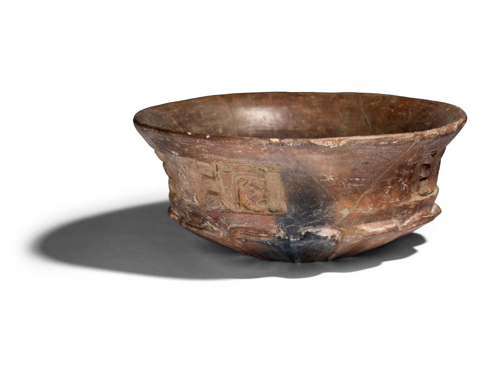 A Maya Terracotta Vessel with Glyphs