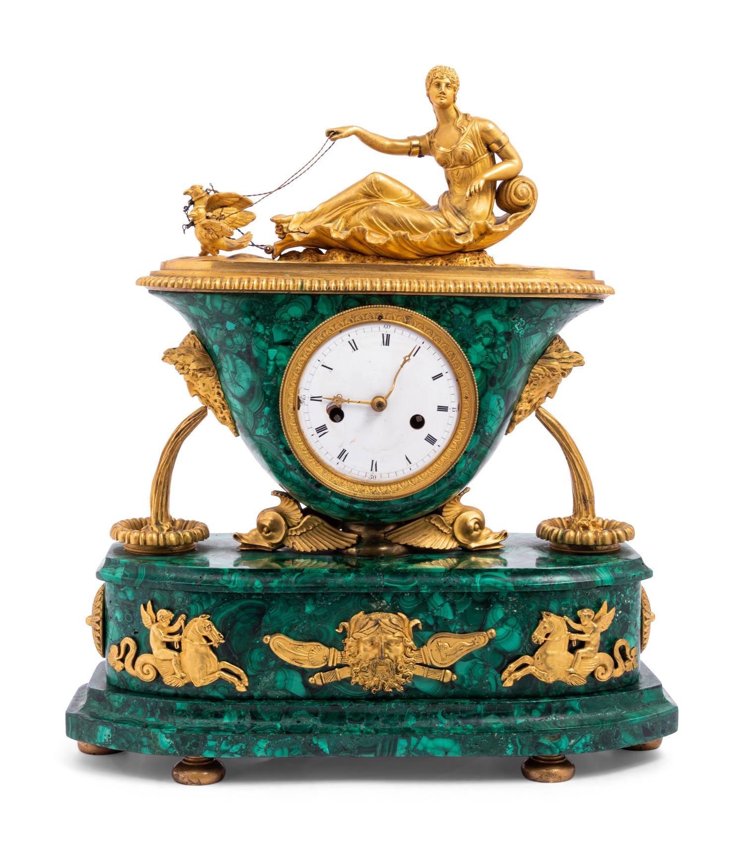An Empire Gilt Bronze Mounted and Malachite Veneered Figural Mantel Clock