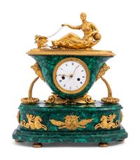 An Empire Gilt Bronze Mounted and Malachite Veneered Figural Mantel Clock