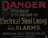 A Parcel Gilt and Reverse Painted Glass American Bank Protection Co. Advertising Sign