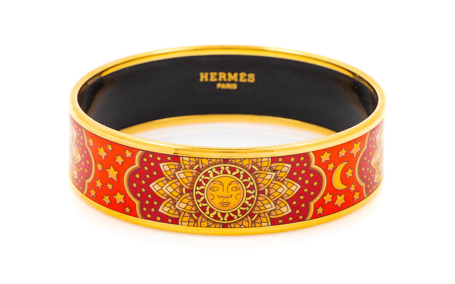 An Hermès Red and Orange Enamel 65mm Bangle, 2.5" diameter, .75" W.