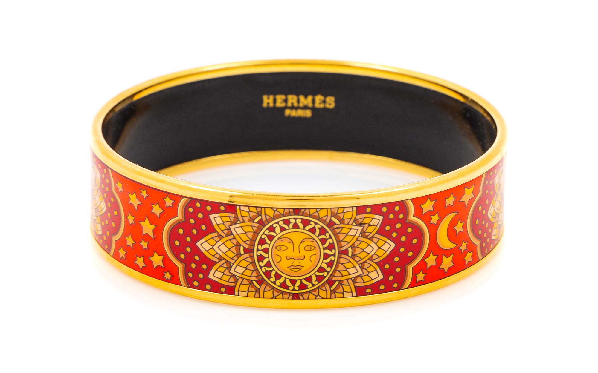 An Hermès Red and Orange Enamel 65mm Bangle, 2.5" diameter, .75" W.
