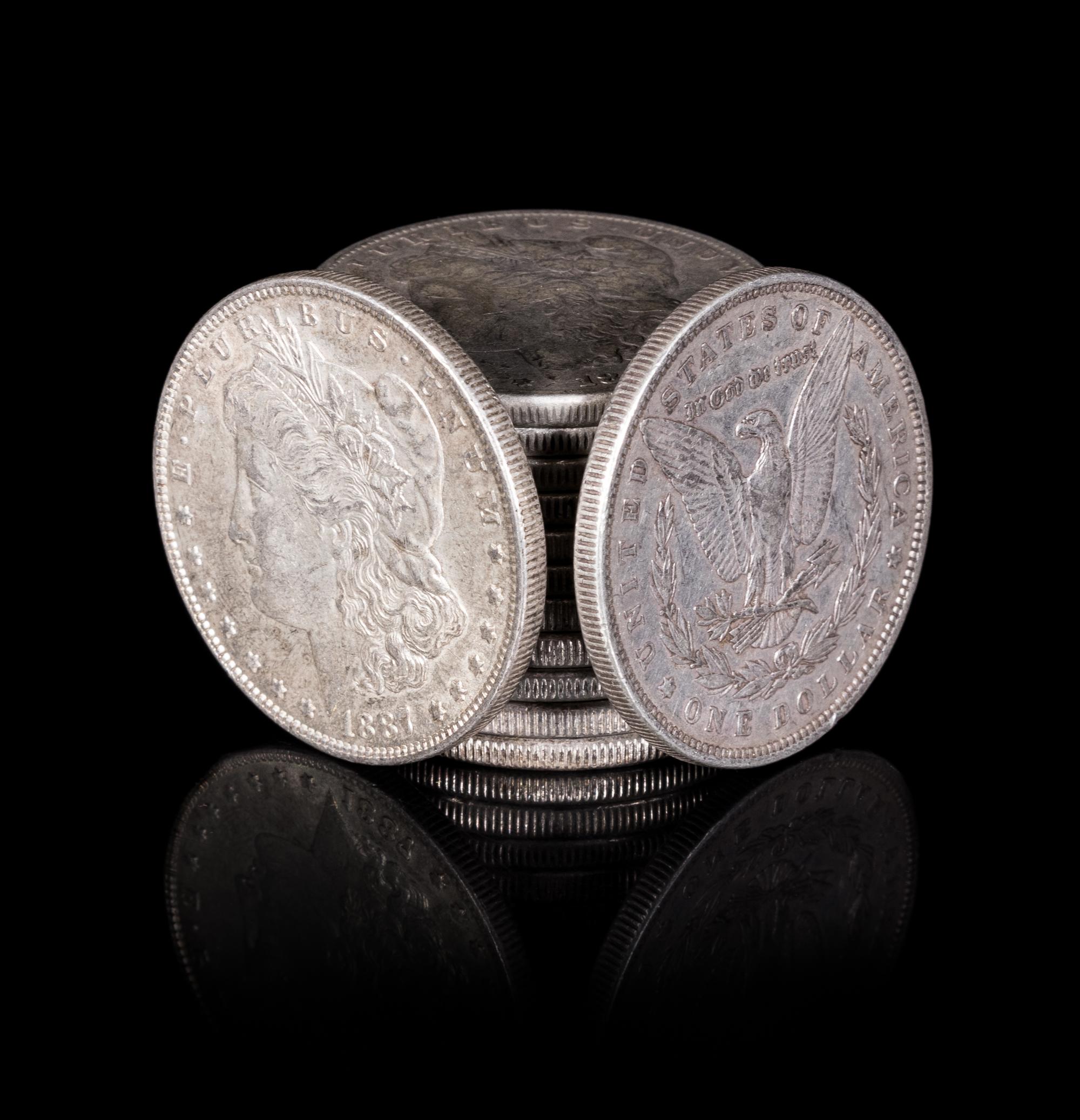 A Group of Thirteen United States 1887 Morgan Silver Dollar Coins