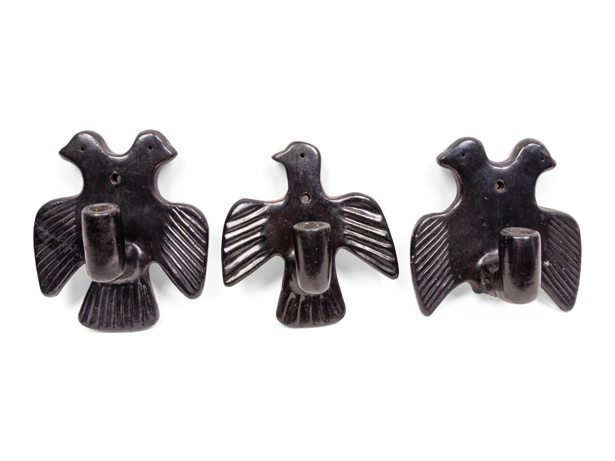 A Group of Blackware Wall Sconces by Domingita Naranjo