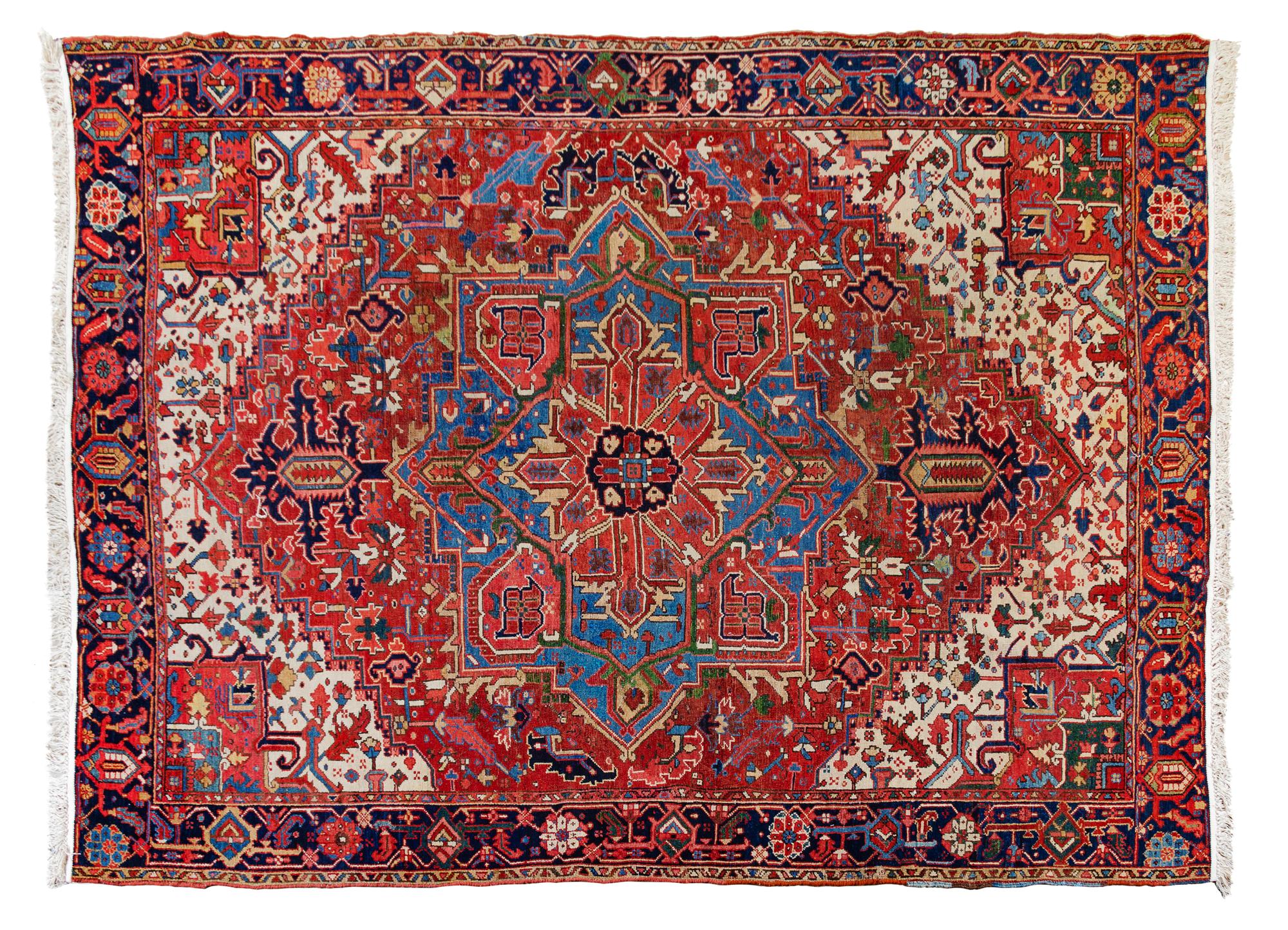A Heriz Wool Rug 10 feet 6 inches x 8 feet 2 inches. — 20TH CENTURY