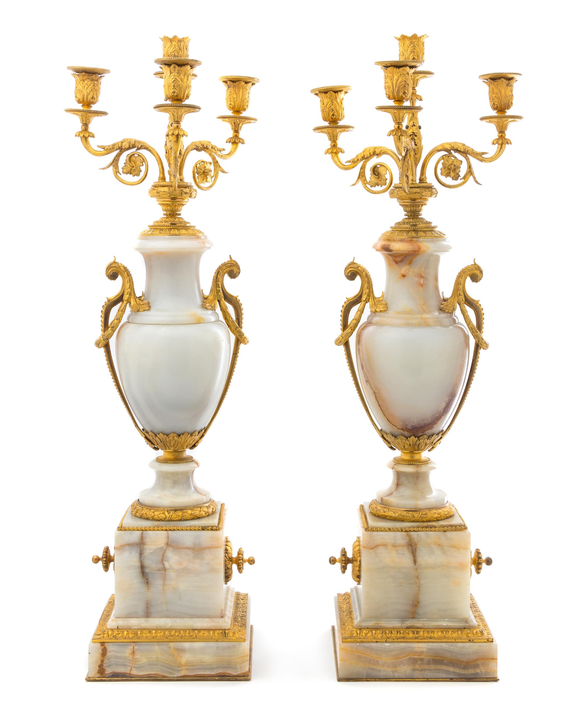 A Pair of Continental Gilt Bronze Mounted Onyx Four-Light Candelabra Height 27 1/8 inches. — 19TH CENTURY