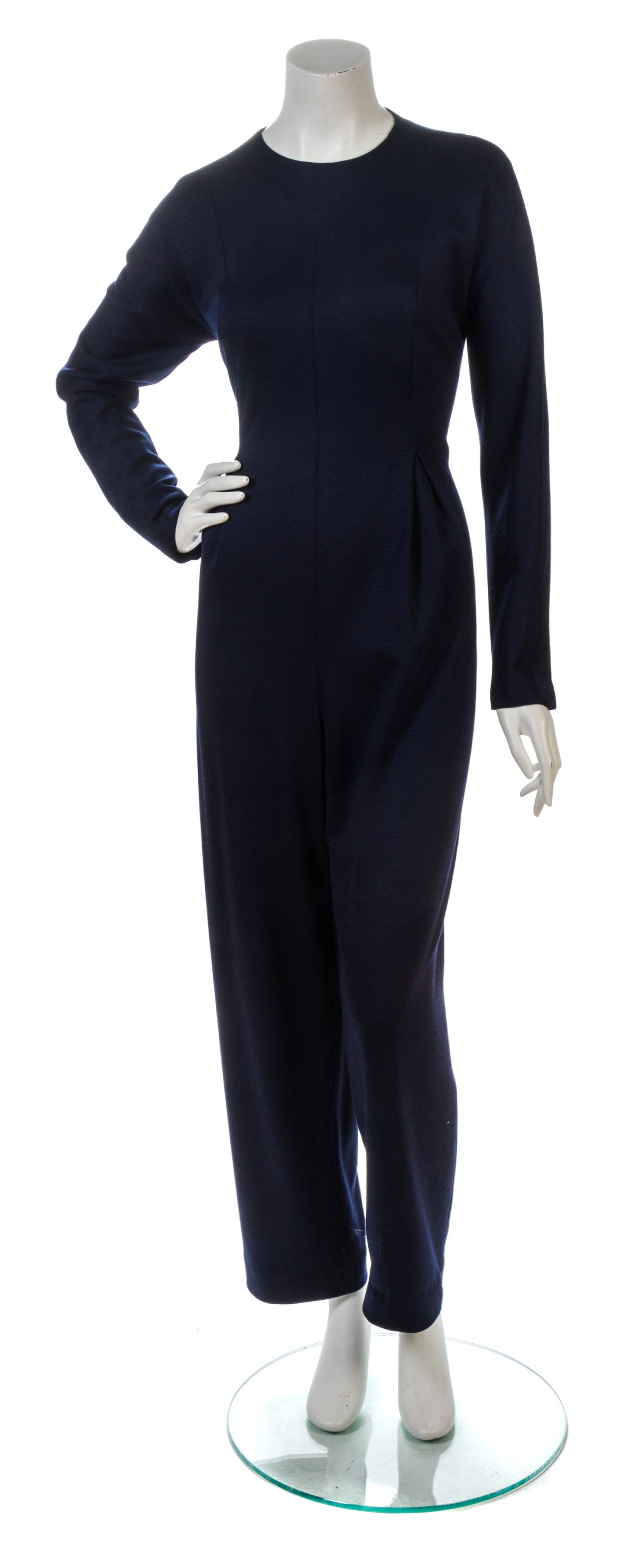 A Geoffrey Beene Navy Knit Jumpsuit.