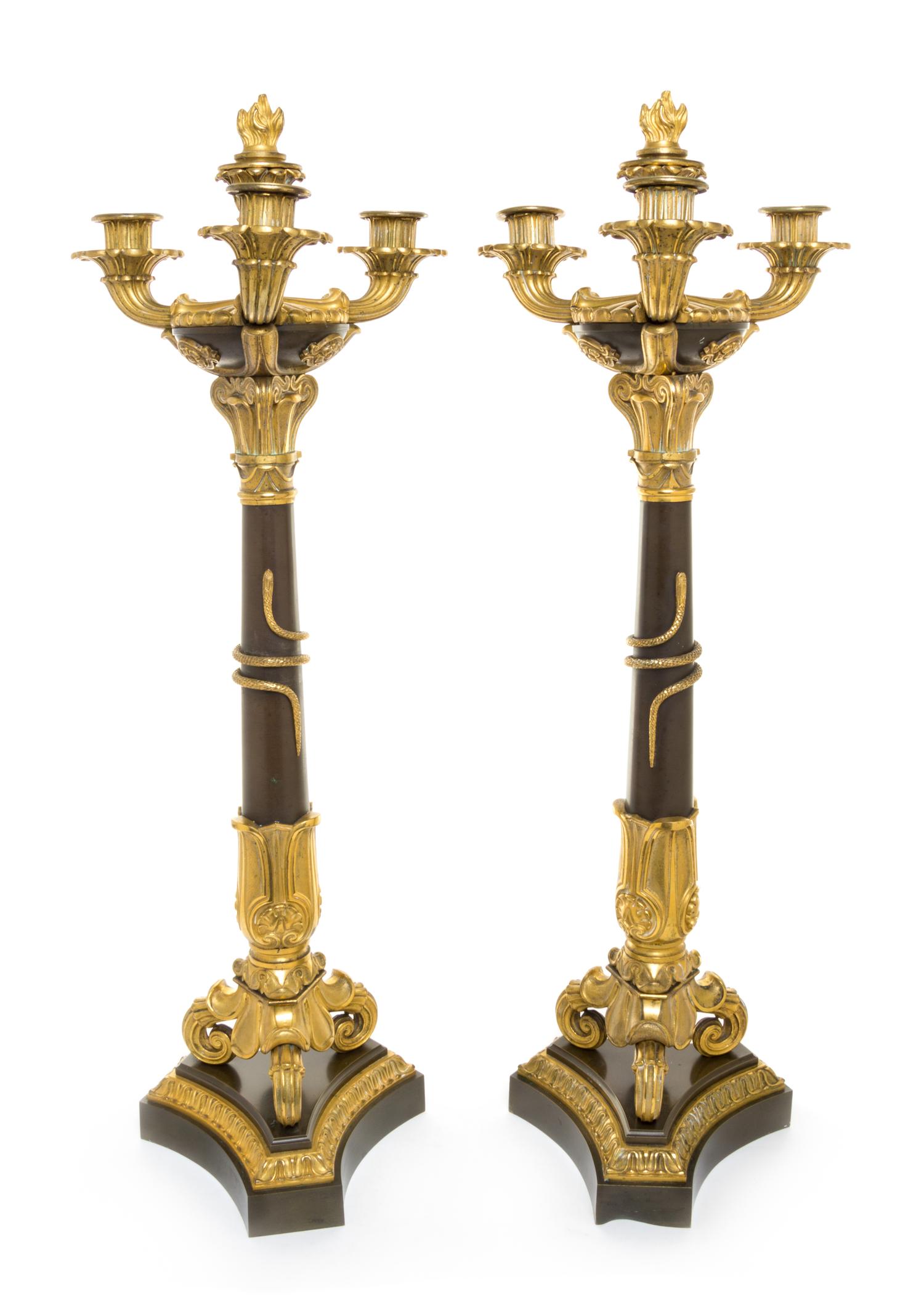 A Pair of Neoclassical Gilt Bronze Four-Light Candelabra Height 26 1/2 inches.