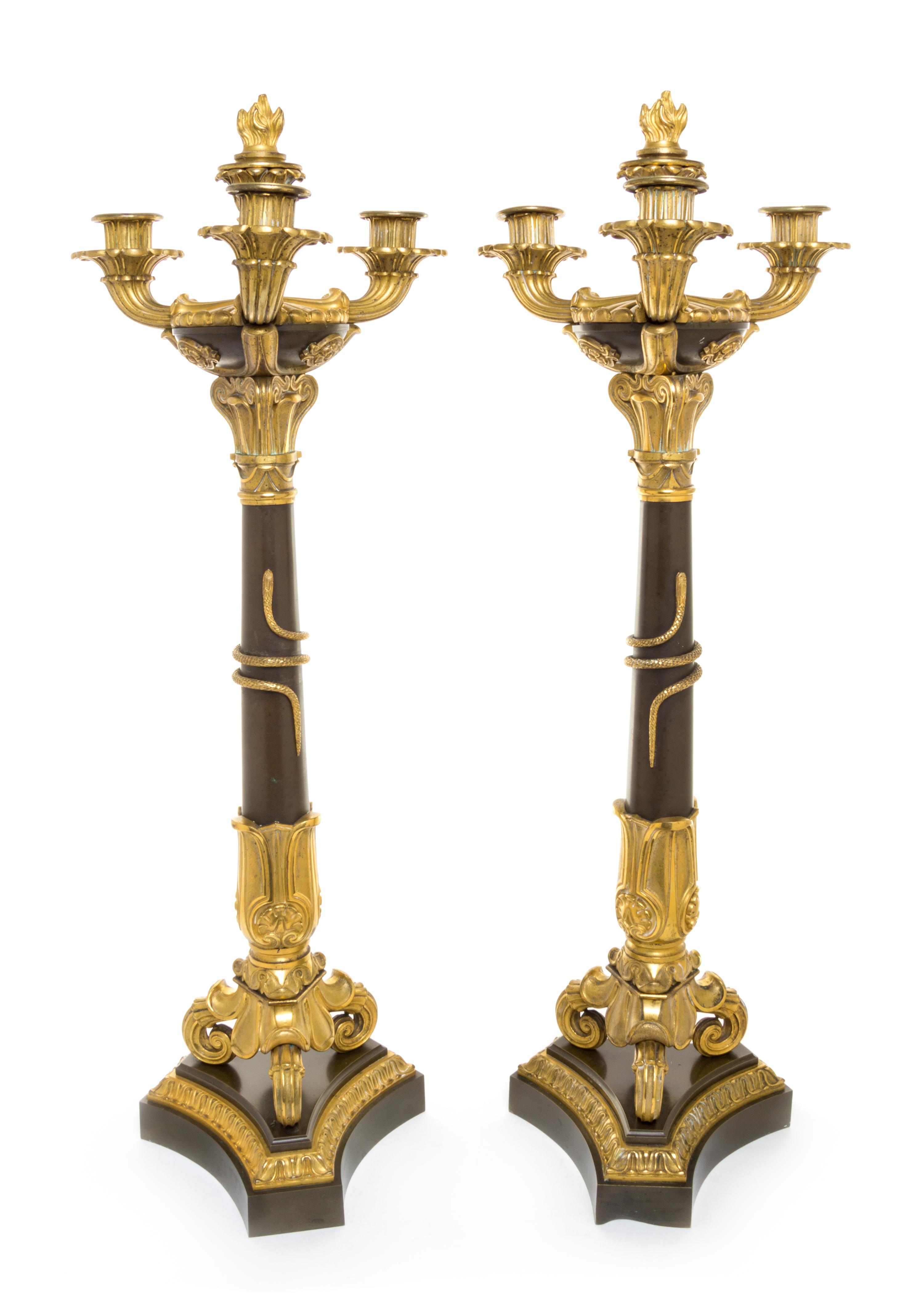 A Pair of Neoclassical Gilt Bronze Four-Light Candelabra Height 26 1/2 inches.