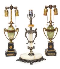 A Pair of Gilt Metal Mounted Oynx Lamps Height of tallest 19 inches.