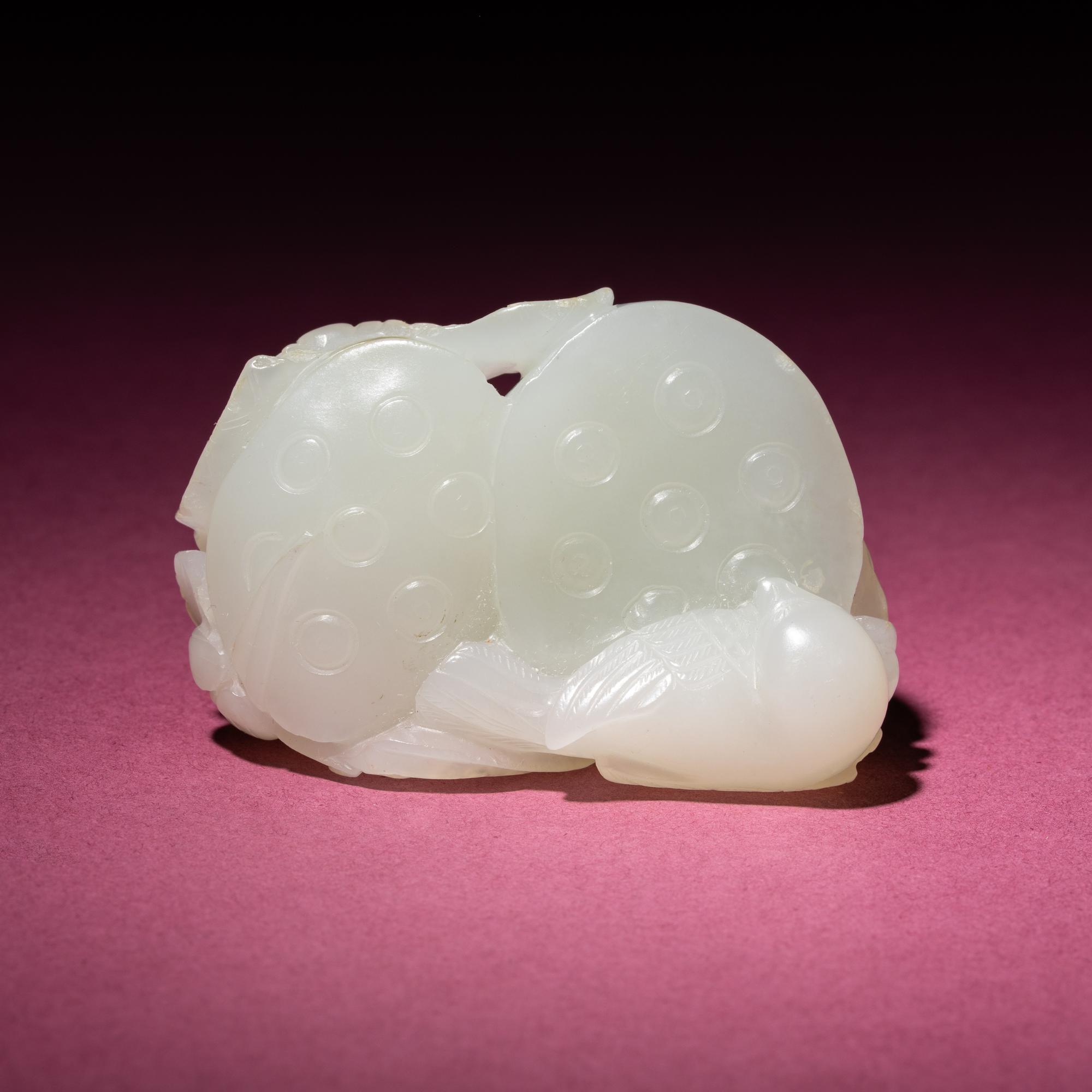 A Chinese White Jade Carving of Double Lotus Pods, 18th/19th Century — 清中期 白玉雙蓮子把件