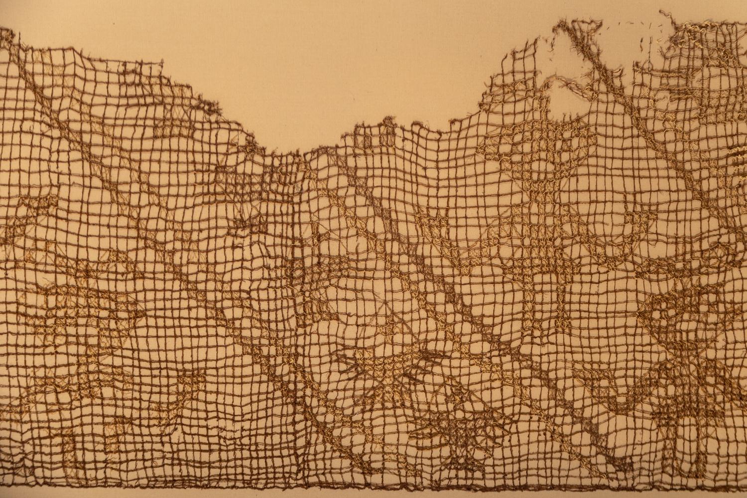A Framed Chancay Textile Fragment