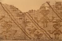 A Framed Chancay Textile Fragment