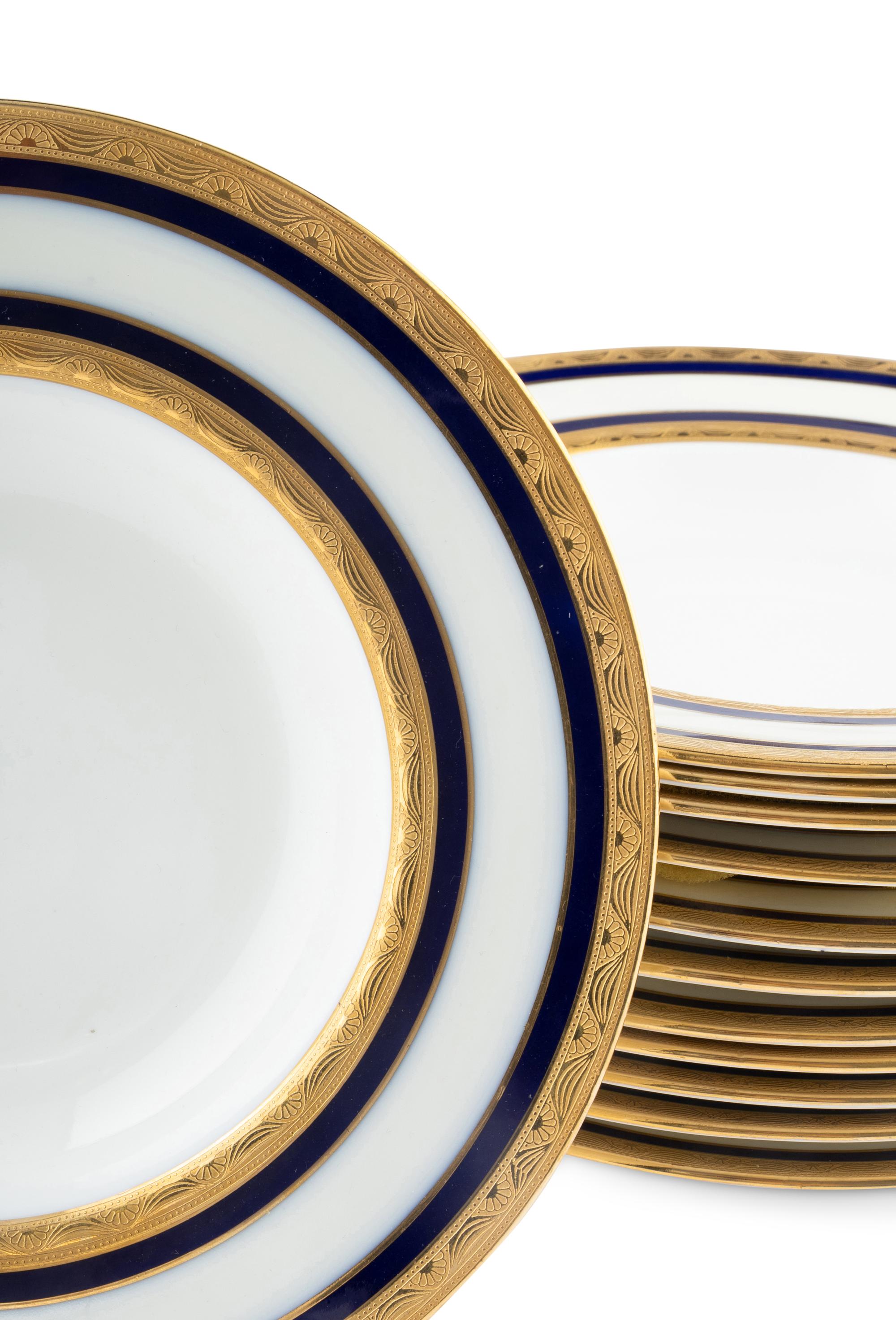 A Set of Twelve Mintons Porcelain Dinner Plates and Salad Plates