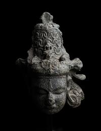 An Indian Carved Black Stone Head of a Vishnu