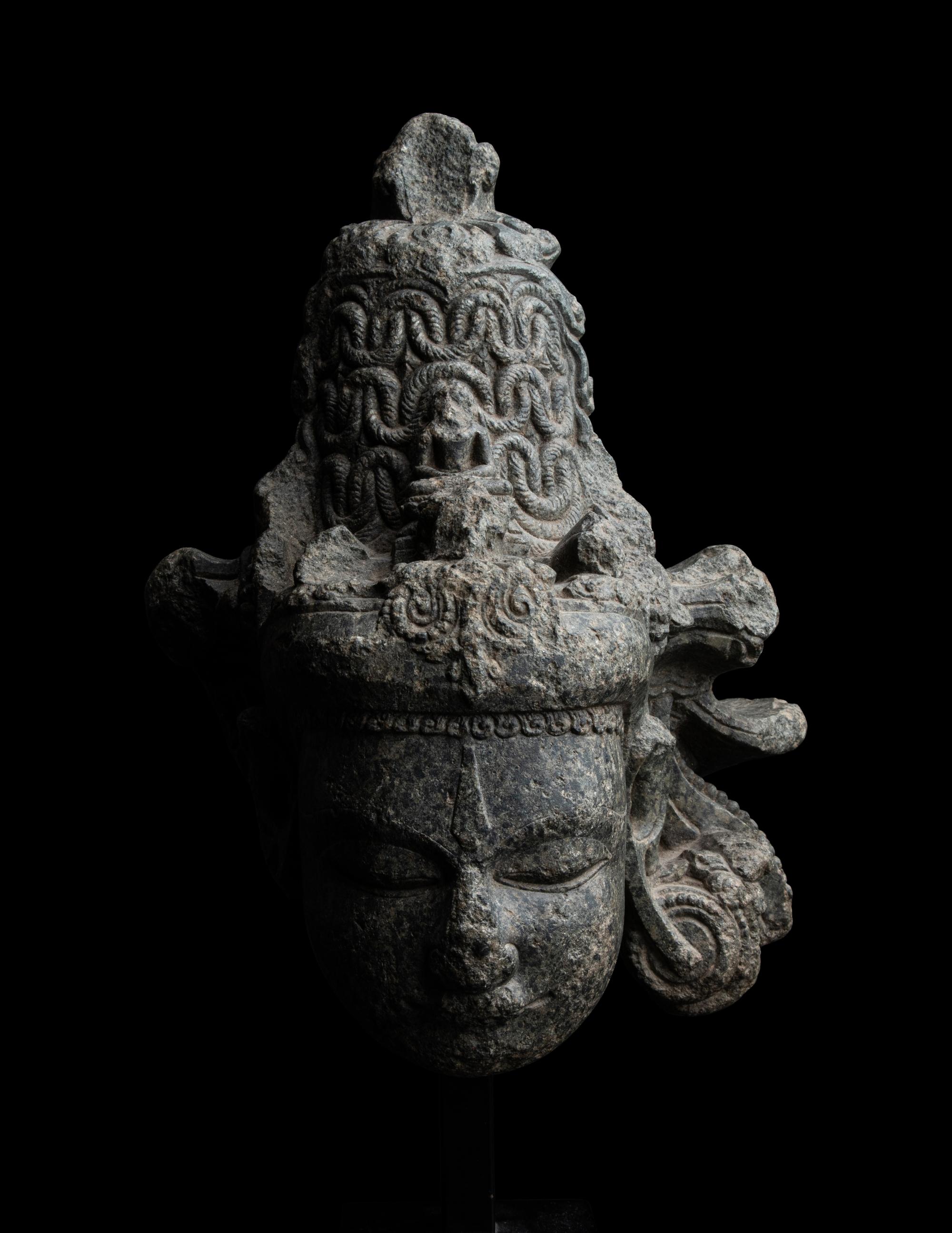 An Indian Carved Black Stone Head of a Vishnu