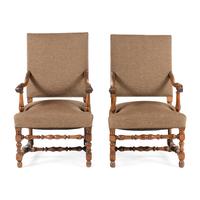 A Near Pair of Continental Baroque Style Walnut Armchairs