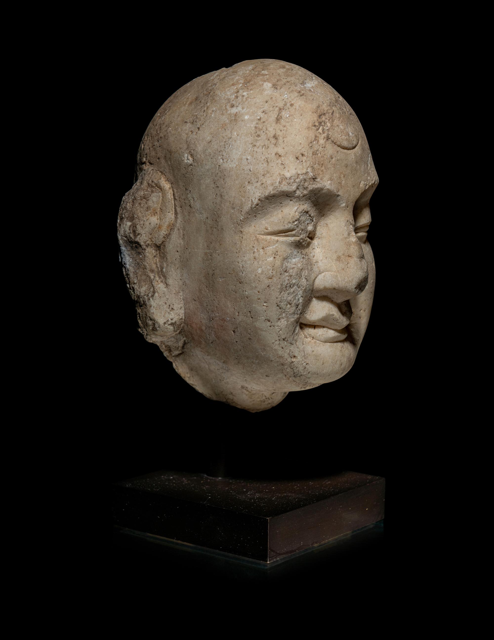 A Chinese Marble Carved Head of a Luohan