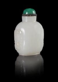 A Glass Imitating White Jade Lion Mask Snuff Bottle Height 3 inches.