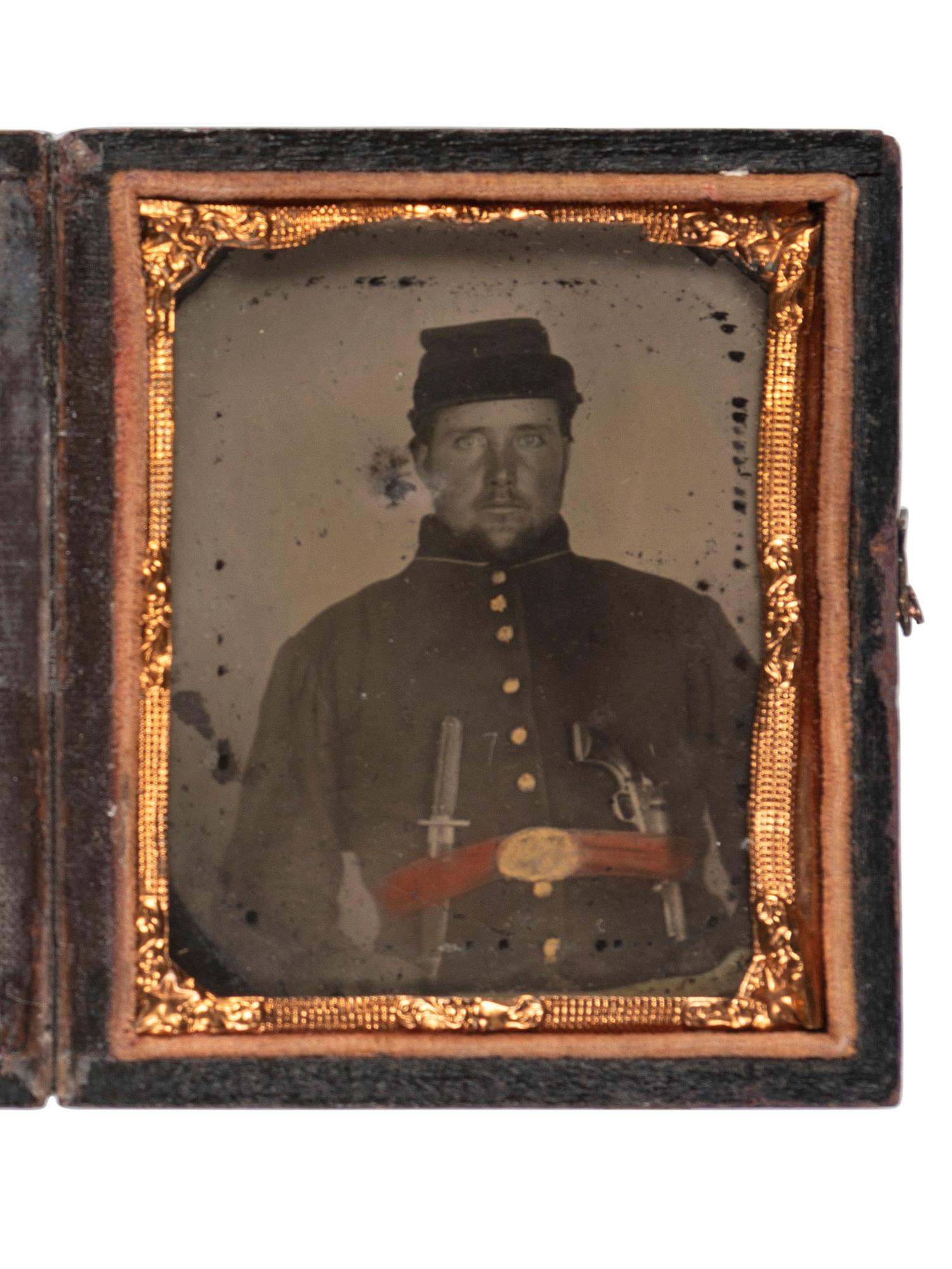 [CIVIL WAR]. Ninth plate ambrotype of Union soldier armed with Bowie knife and pistol.