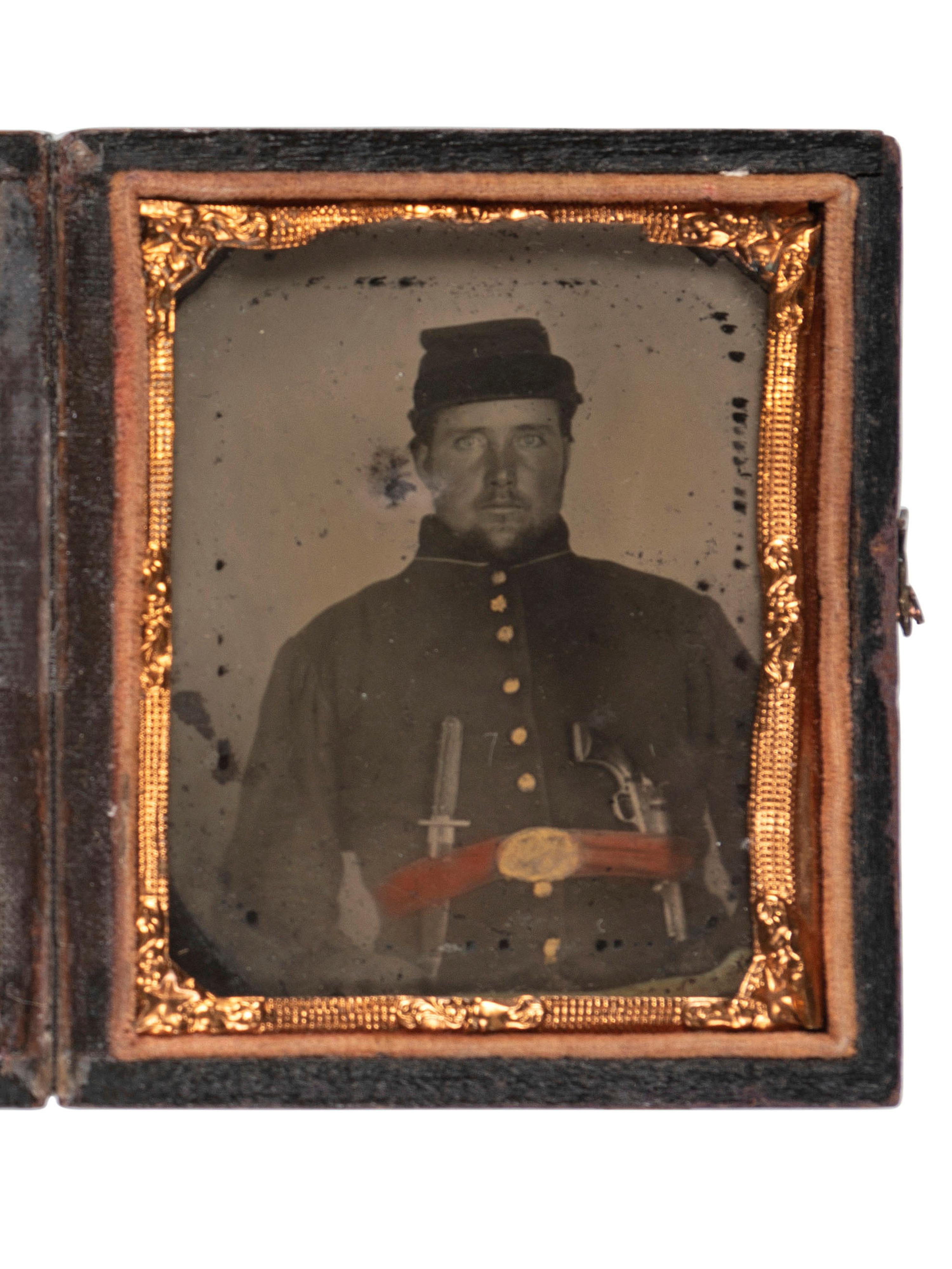 [CIVIL WAR]. Ninth plate ambrotype of Union soldier armed with Bowie knife and pistol.