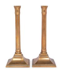 A Pair of George III Bronze Candlesticks
