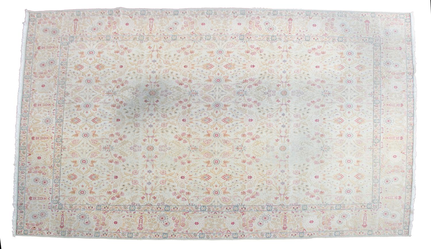 An Indian Cotton and Wool Rug 15 feet 1 inch x 12 feet. — 20TH CENTURY
