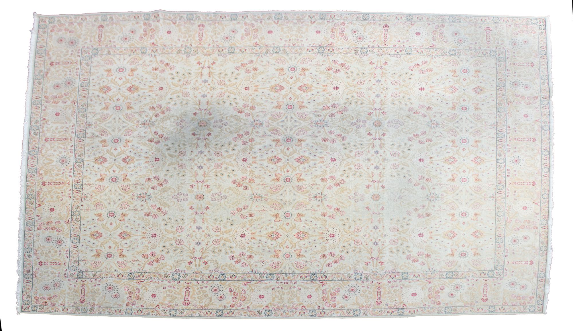 An Indian Cotton and Wool Rug 15 feet 1 inch x 12 feet. — 20TH CENTURY