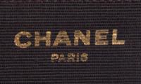 A Chanel Brown Velvet Handbag, 8.5" x 6" x 1".