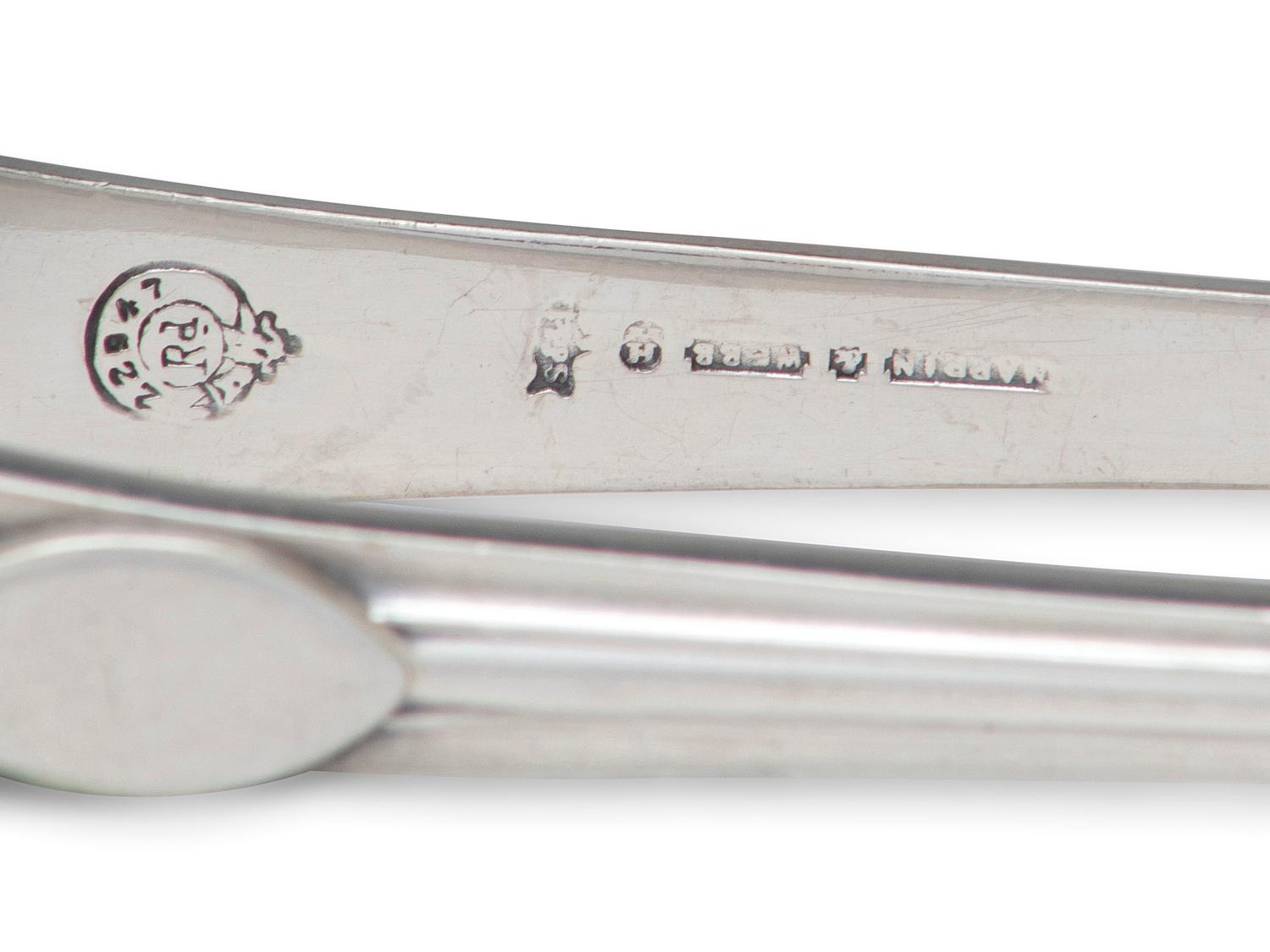 A Collection of Irish and English Silver Flatware Articles