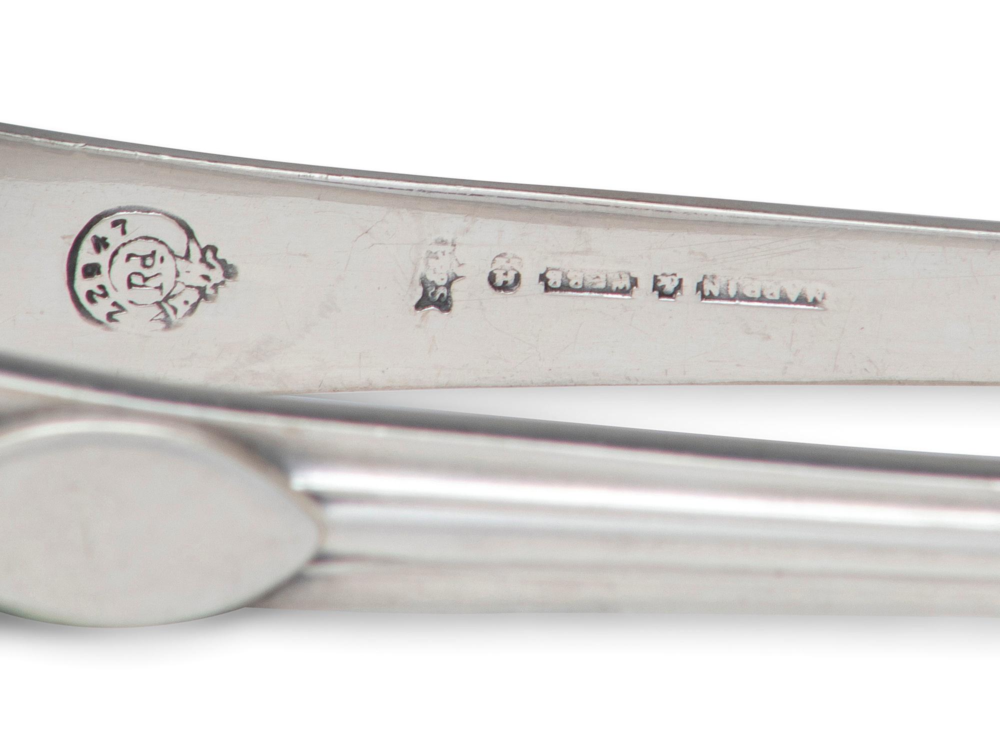 A Collection of Irish and English Silver Flatware Articles