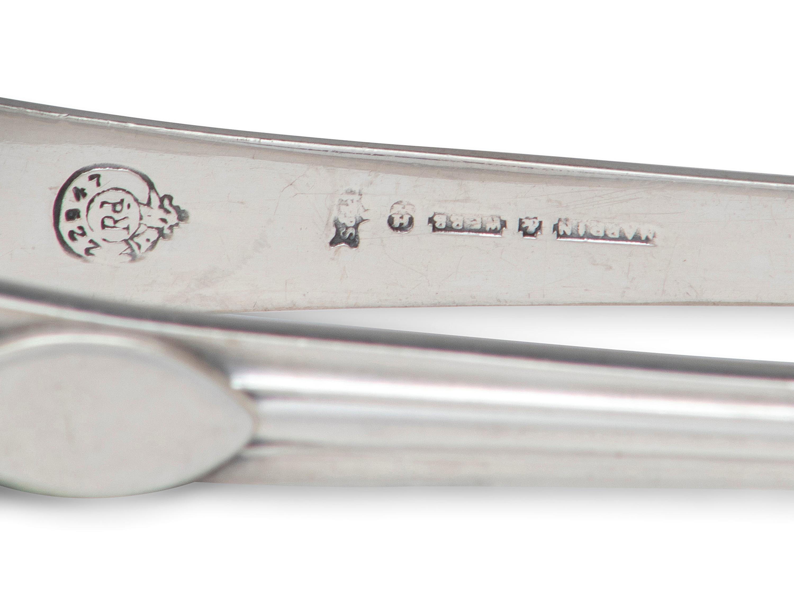 A Collection of Irish and English Silver Flatware Articles