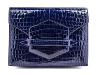 An Hermes Navy Niloticus Crocodile Faco Clutch, 9.25" x 7" x 1".