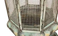 A Pair of Weathered Painted Sheet Metal Lanterns Converted to Bird Cages
