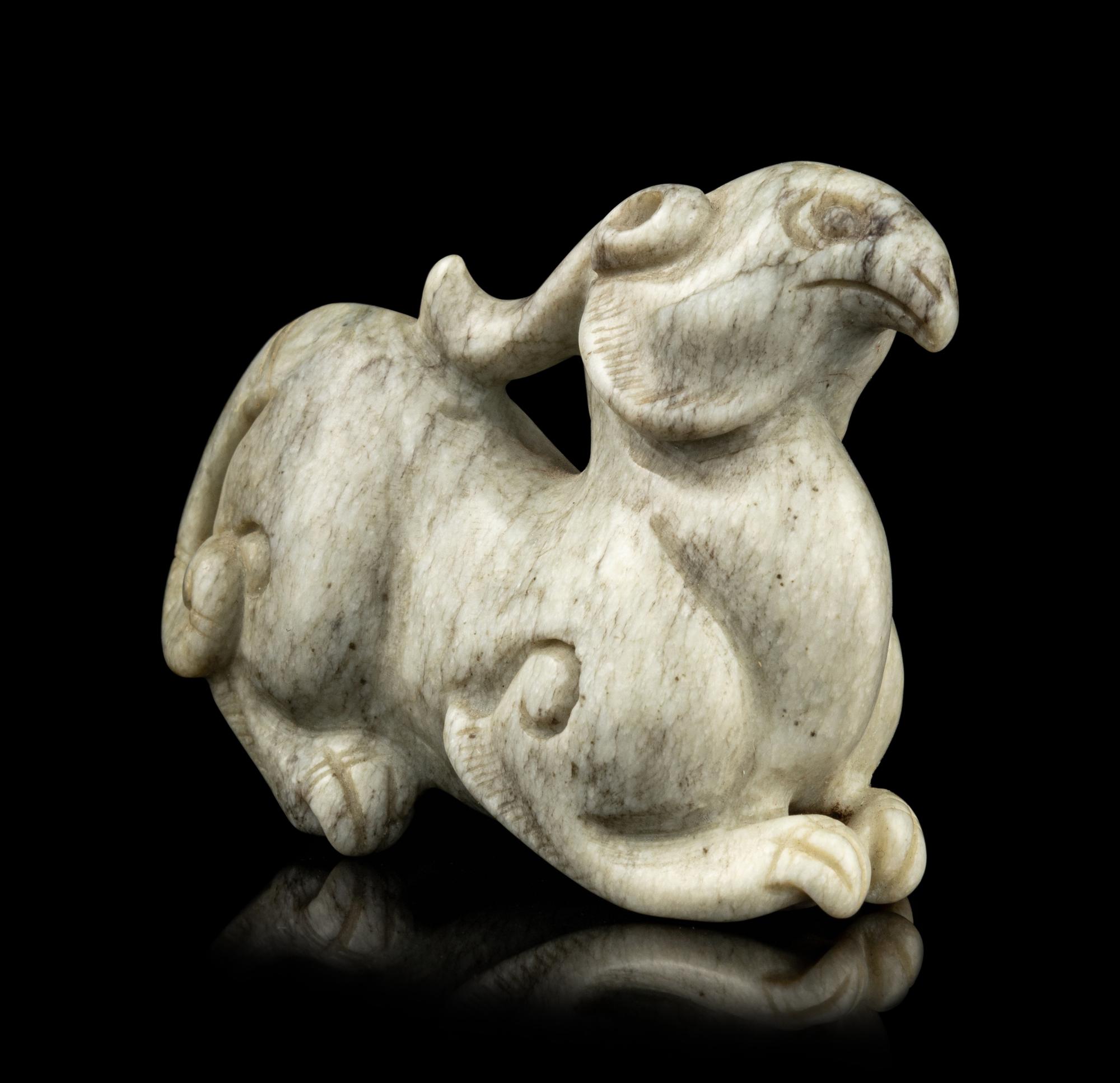 A Chinese Chicken Bone Jade Mythical Beast
