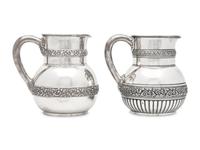 Two Similar Sterling Silver Floral Repousse Water Pitchers, Tiffany & Co., New York, NY, Circa 1880-1890s