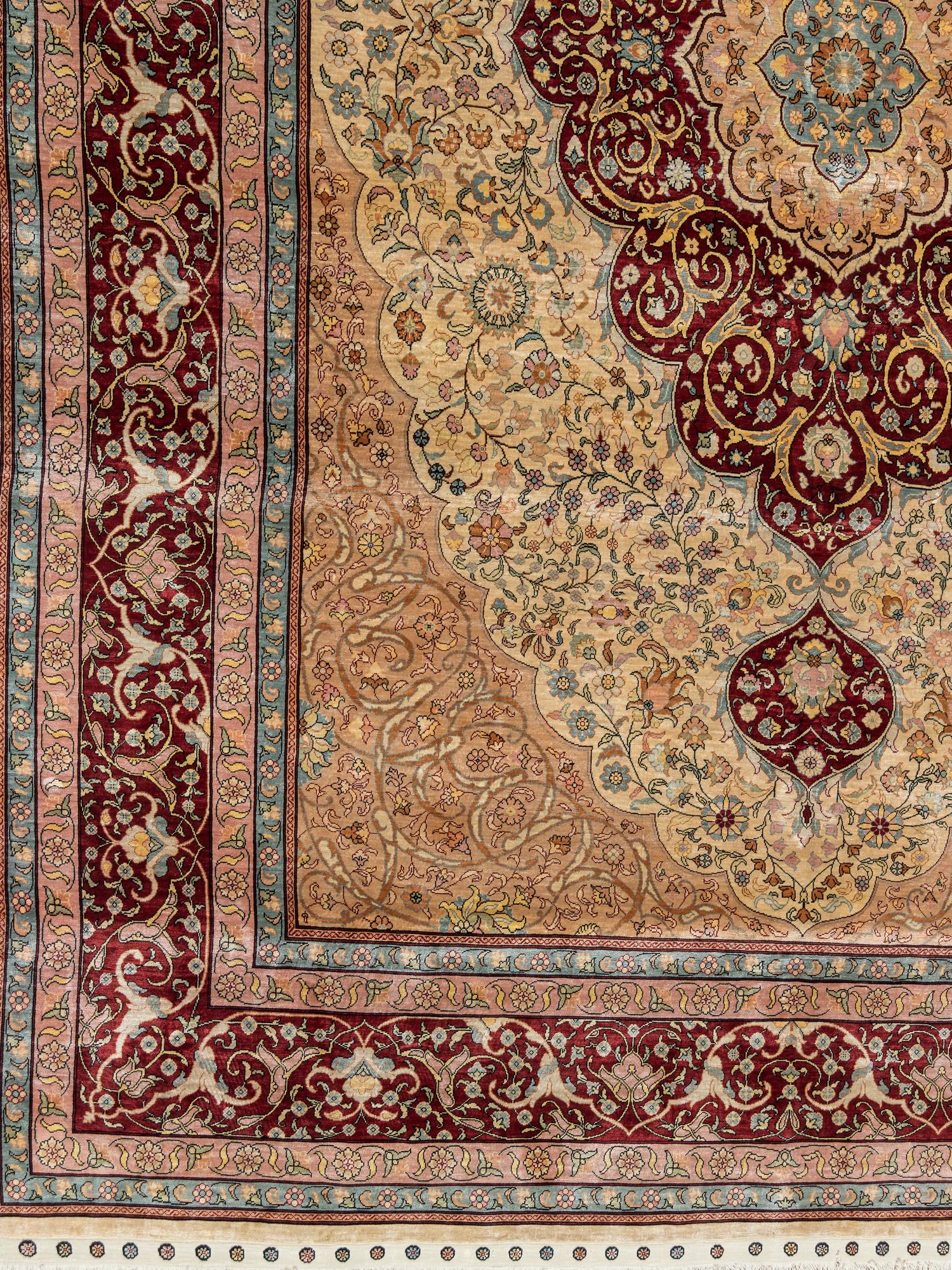 A Signed Tabriz Silk Rug