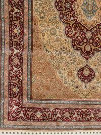A Signed Tabriz Silk Rug