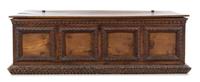 A Florentine Walnut Cassone Height 22 1/2 x width 68 x depth 22 inches. — 17TH CENTURY AND LATER