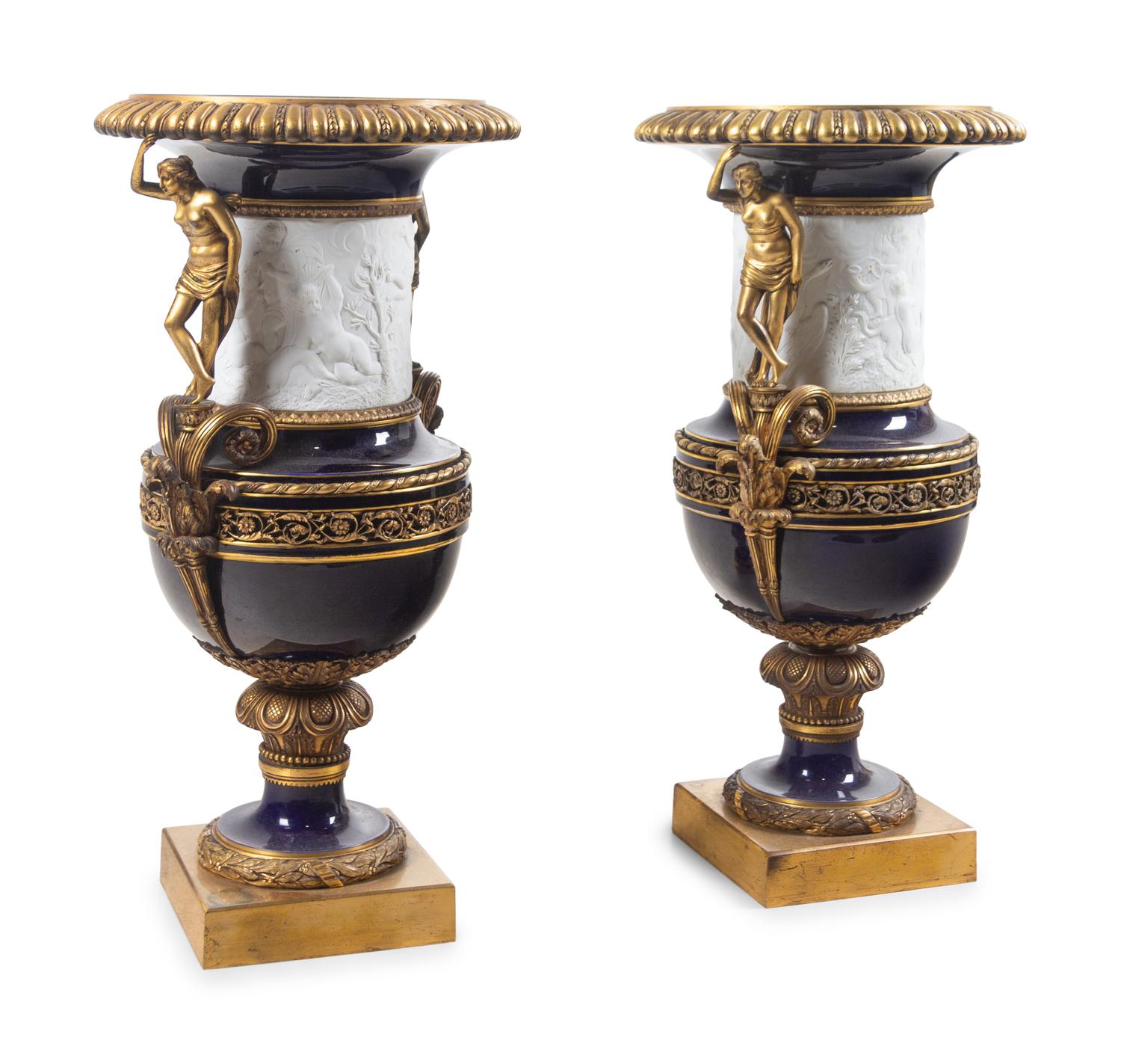 A Pair of French Gilt Bronze Mounted Bisque and Cobalt Glazed Porcelain Urns