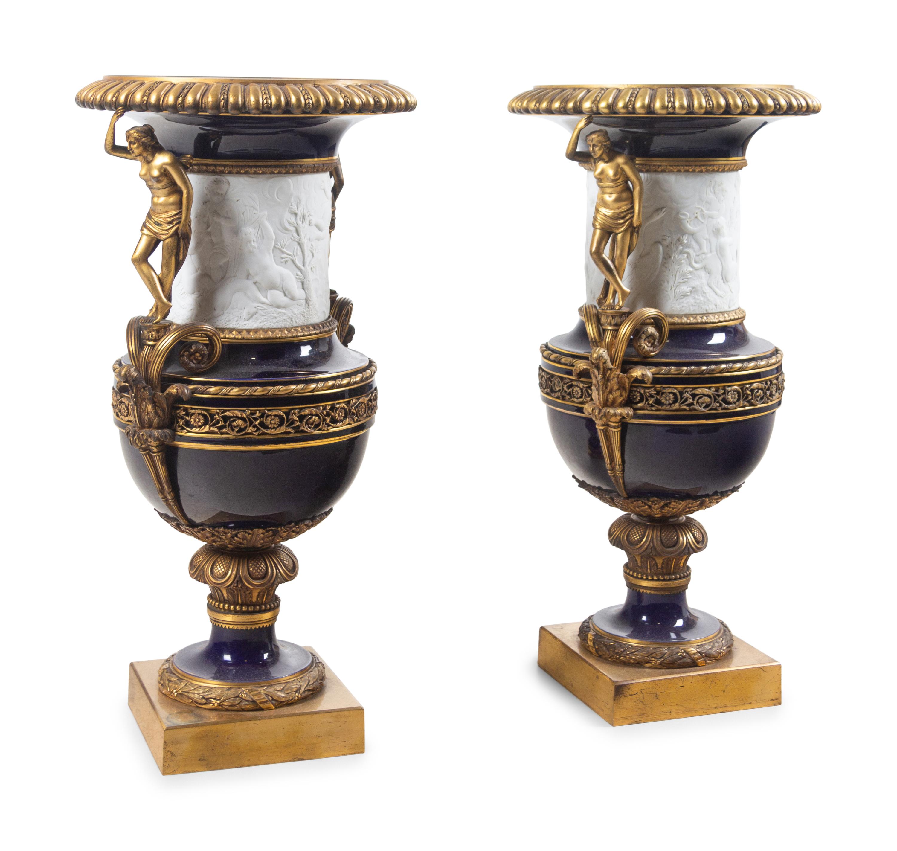 A Pair of French Gilt Bronze Mounted Bisque and Cobalt Glazed Porcelain Urns