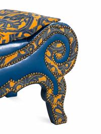 A Blue Leather Scrolled Stool