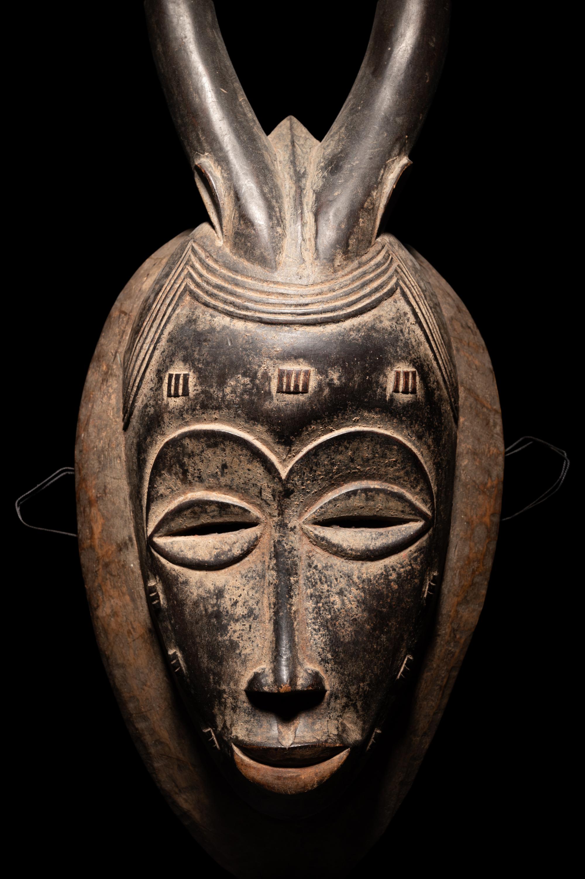 Two Baule Wood Masks