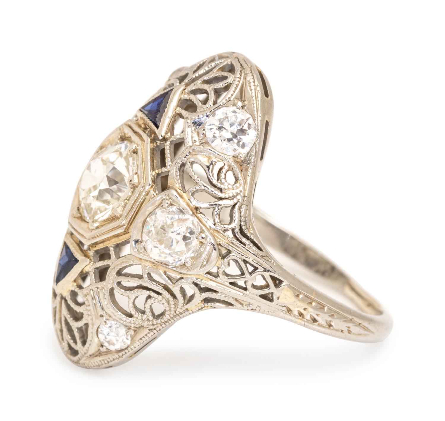 An Art Deco 18 Karat White Gold, Diamond and Synthetic Sapphire Ring,