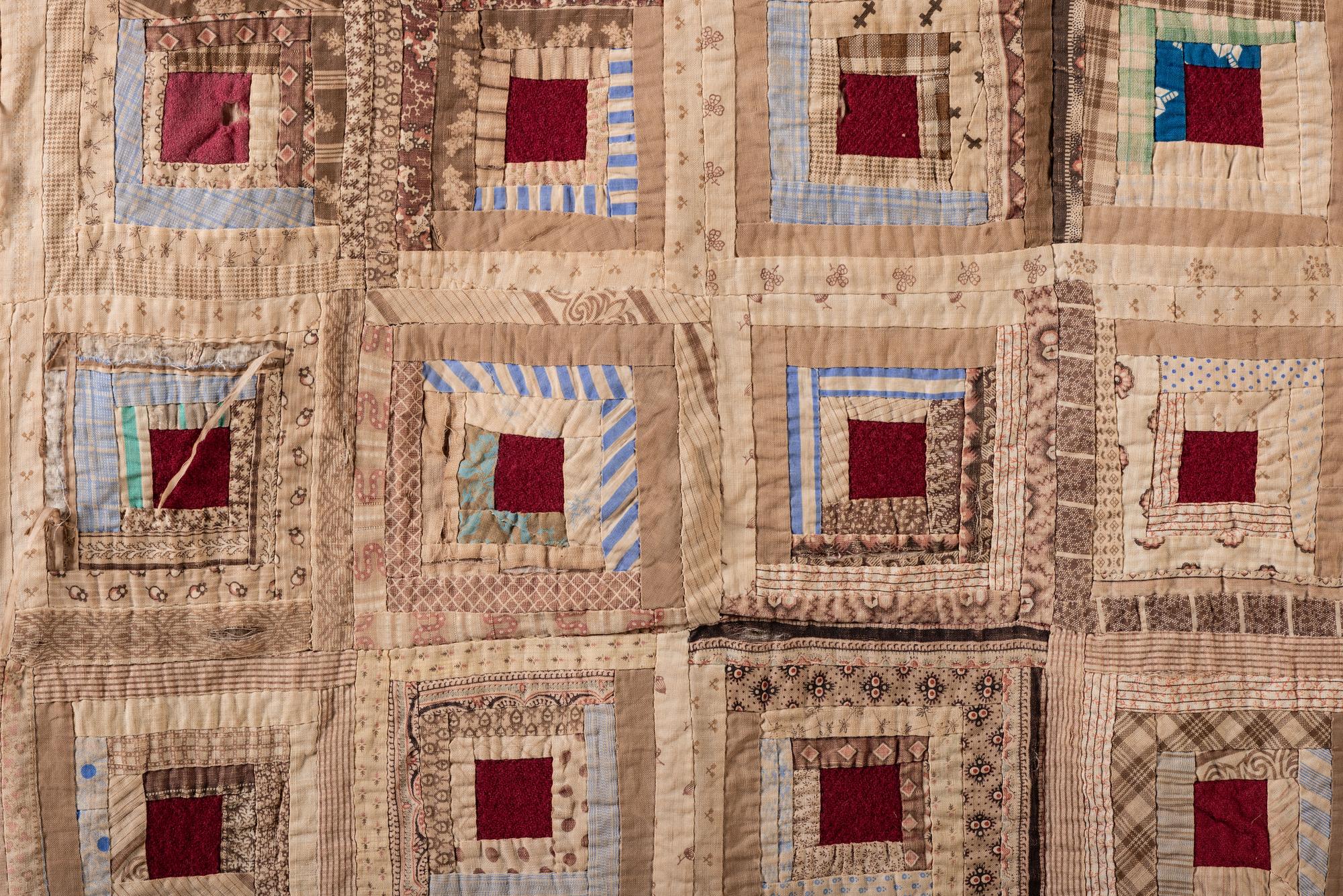 A Doll's Pieced Cotton Log Cabin Quilt