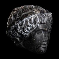A Roman Black Dolomite Head of a Youth