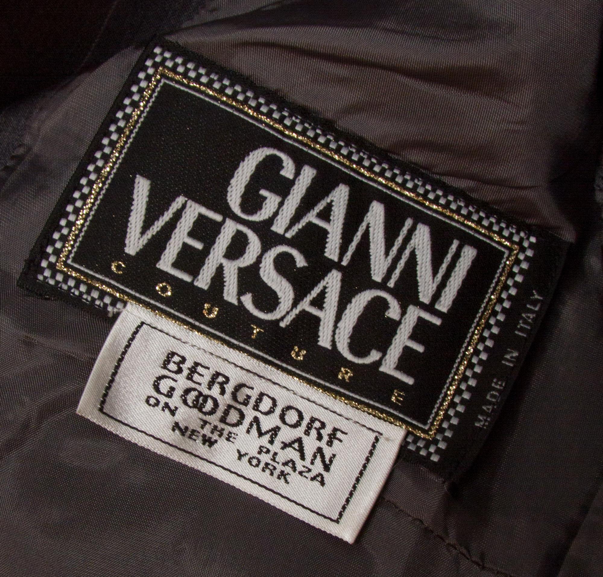 A Gianni Versace Grey Silk Double Breasted Pinstripe Skirt Suit, Size 40.